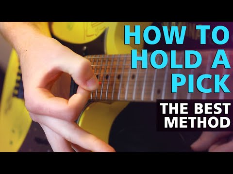 How To Hold Your Guitar Pick Properly (The BEST Way, With Close Up Examples)