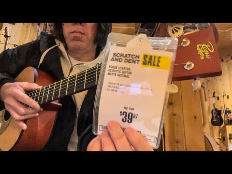 This Dude playing $39.99 Cheap Acoustic Guitar at Guitar Center