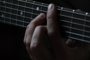 barre chord guitar hand position