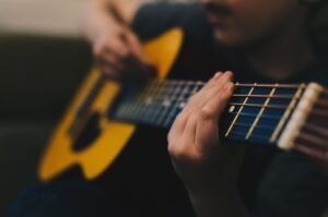 practicing your guitar strumming while muting the strings