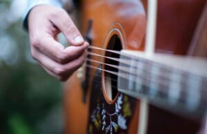 benefits of using your fingers to play guitar