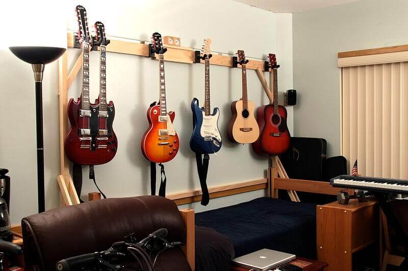 guitars hanging on the wall