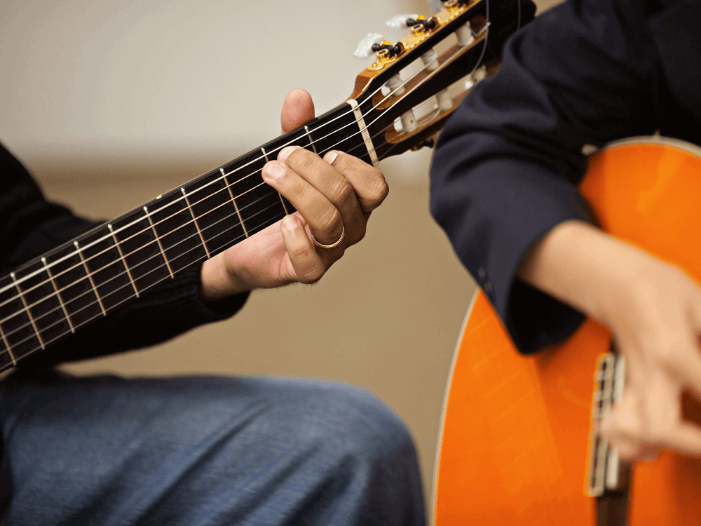 building a strong network and collaborating with other guitar players