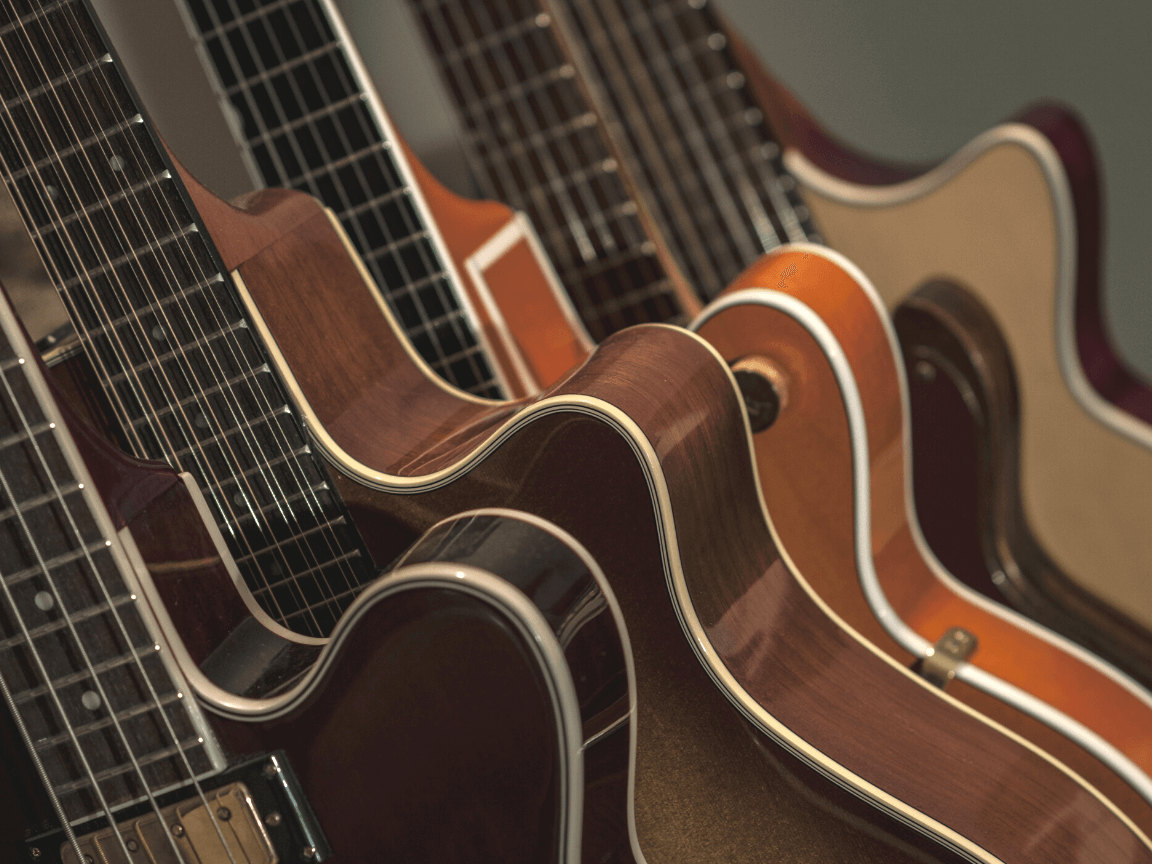 which guitar type is easier to learn