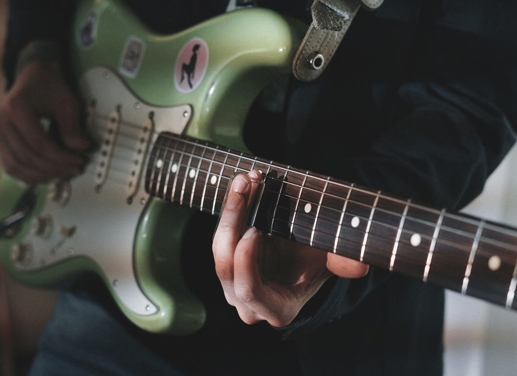 how to play pinch harmonics on a guitar