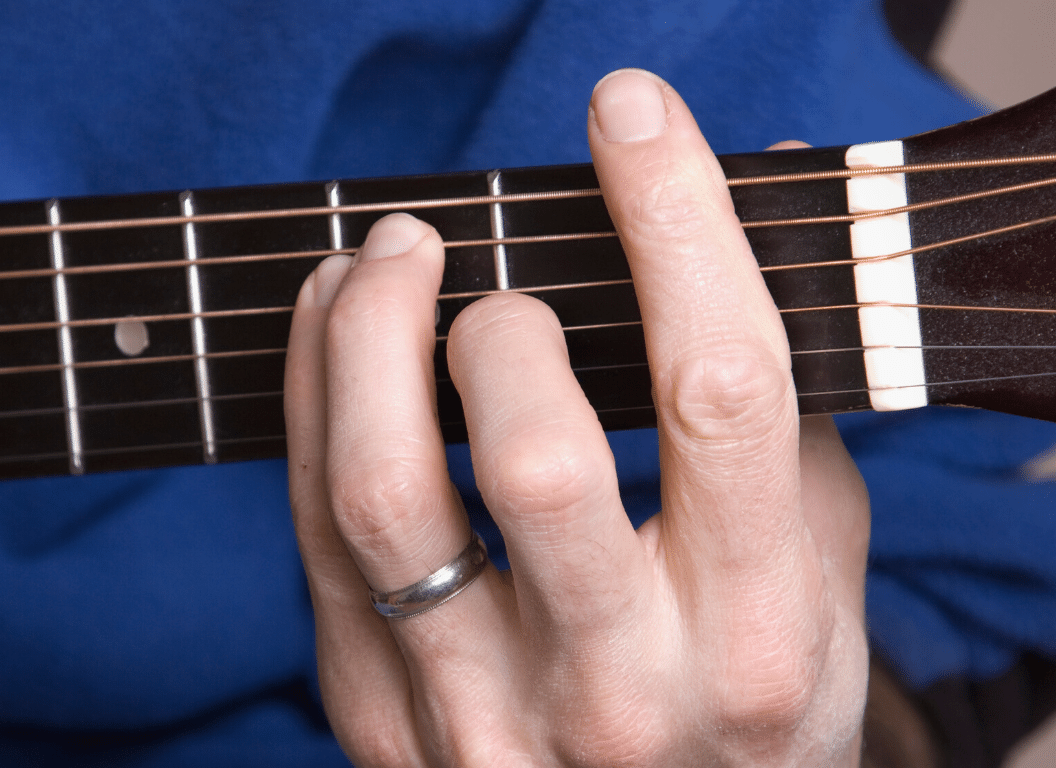 is it harder to play barre chords on an acoustic guitar